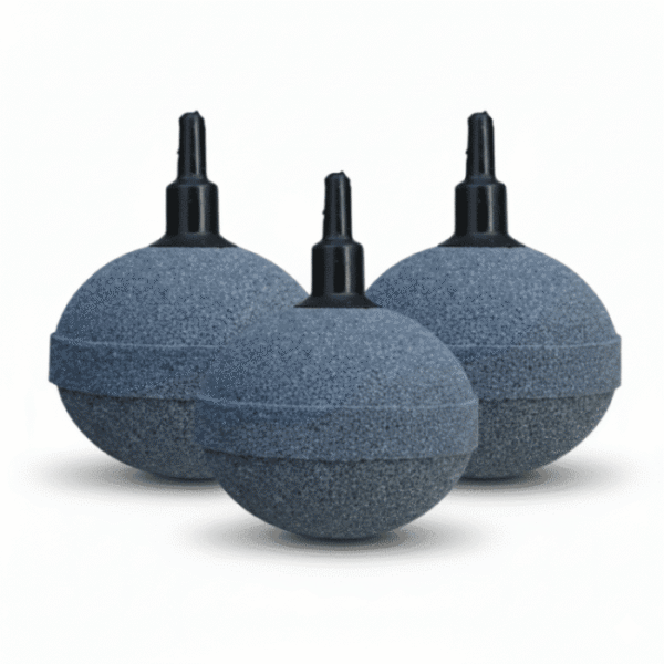 Close-up of a 50mm ceramic air stone, spherical golf ball shape, releasing a dense stream of fine bubbles for maximum oxygenation in pond or hydroponic systems.